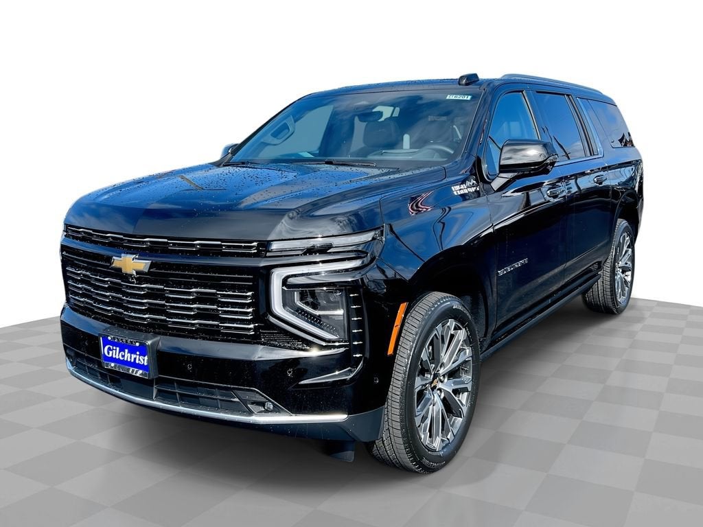 2026 Chevrolet Suburban High Country in Black — front three-quarter view