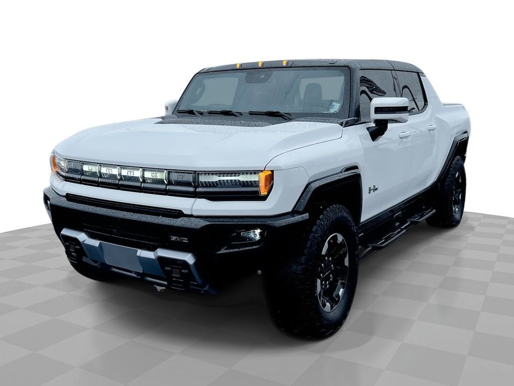 2022 GMC HUMMER EV Pickup Hummer EV Pickup in Interstellar White — front three-quarter view