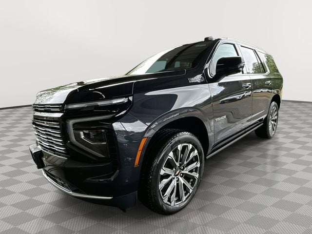 2026 Chevrolet Tahoe High Country in Dark Ash Metallic — front three-quarter view