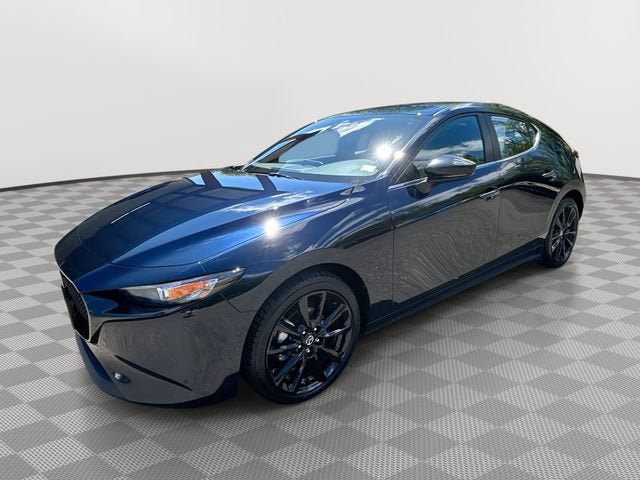 2024 Mazda Mazda3 Hatchback 2.5 S Select Sport in Ro1 — front three-quarter view